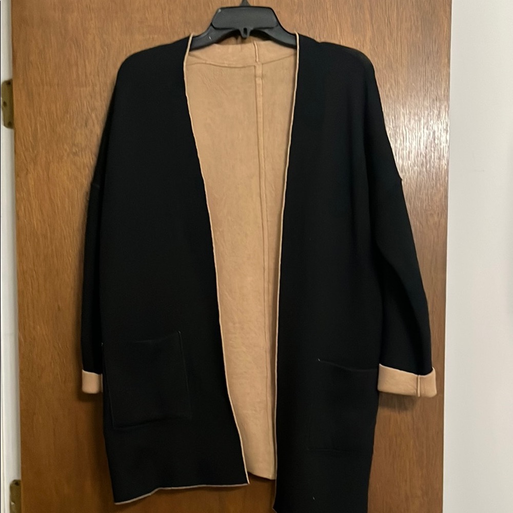 Reversible black and camel long cardigan with pockets, seam detail and side slit